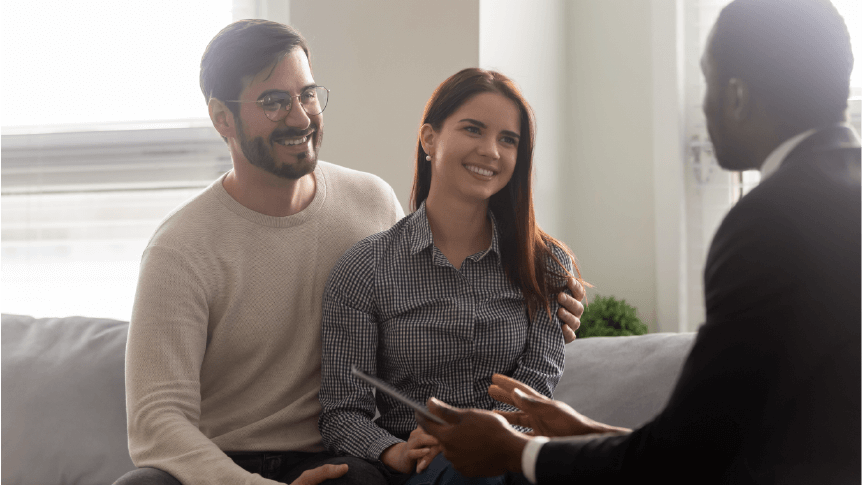Couple having a chat with a mortgage broker