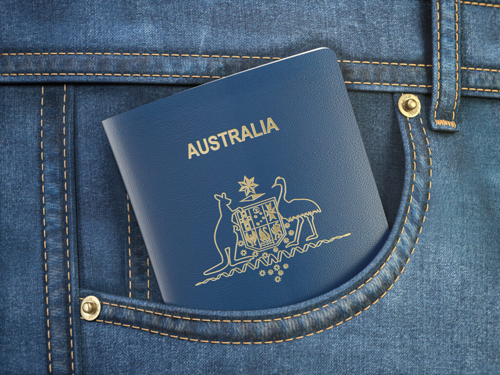 Australian citizenship/residency status. Passport of Australia in pocket jeans.